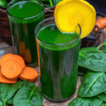Carrot Spinach Juice Recipe: A Nutritious Boost to Your Day 4 Blending carrots, spinach, apple, and lemon in a blender to make Carrot Spinach Juice."