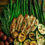Juicy Grilled Chicken Platter: Your Ultimate Summer BBQ Delight 4 Grilled chicken platter with roasted vegetables and grilled zucchini boats.