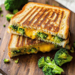 Broccoli Cheddar Grilled Cheese: The Ultimate Comfort Food 4 Broccoli Cheddar Grilled Cheese Sandwich with melted cheese and fresh broccoli