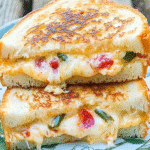 Torched Hatch Chile and Pimento Grilled Cheese: A Fiery Twist on the Classic Sandwich 4 Torched Hatch Chile and Pimento Grilled Cheese with roasted chiles and melted cheese