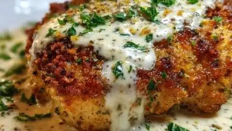 Crispy Herb-Crusted Chicken Romano with Tangy Parmesan Cream Sauce