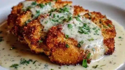Parmesan Crusted Chicken with Creamy Garlic Sauce – Easy Family Dinner Recipe