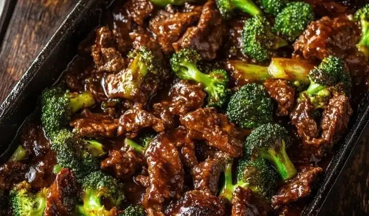 Beef and Broccoli Stir-Fry 3 Beef and broccoli stir-fry served in a bowl with vibrant vegetables.