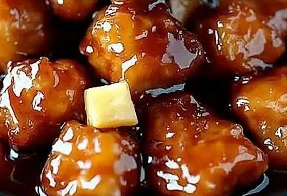 Delicious Brown Sugar Pineapple Chicken dish garnished with fresh herbs.