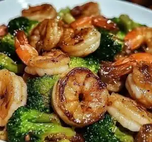 Delicious high-protein honey garlic shrimp served with vegetables