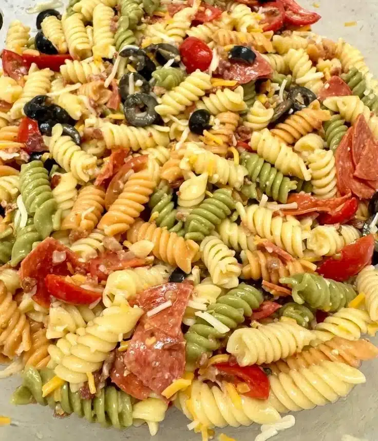 Delicious Olive Garden Pasta Salad with fresh ingredients in a vibrant bowl.