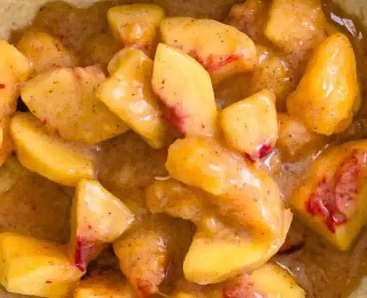 Delicious peaches and cream crumble bars served on a plate