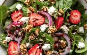 Spring Mix Salad with Balsamic Honey Dressing served in a bowl