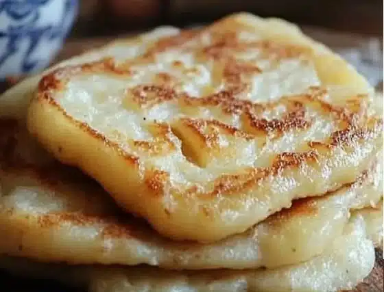 Delicious homemade authentic Irish potato farls on a wooden plate