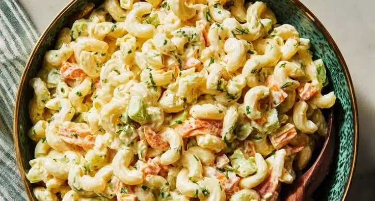 Classic Macaroni Salad 4 Bowl of classic macaroni salad with colorful vegetables and dressing