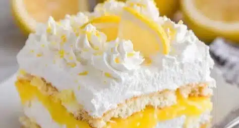 Lemon Lasagna 4 Delicious lemon lasagna dessert garnished with fresh lemon slices