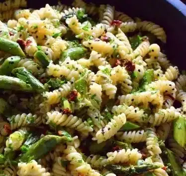 Roasted Asparagus Lemon Butter Pasta Salad 3 Roasted asparagus lemon butter pasta salad garnished with fresh herbs