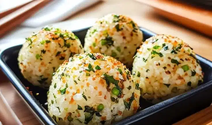 Savory rice balls ready to be served as a tasty snack or appetizer.