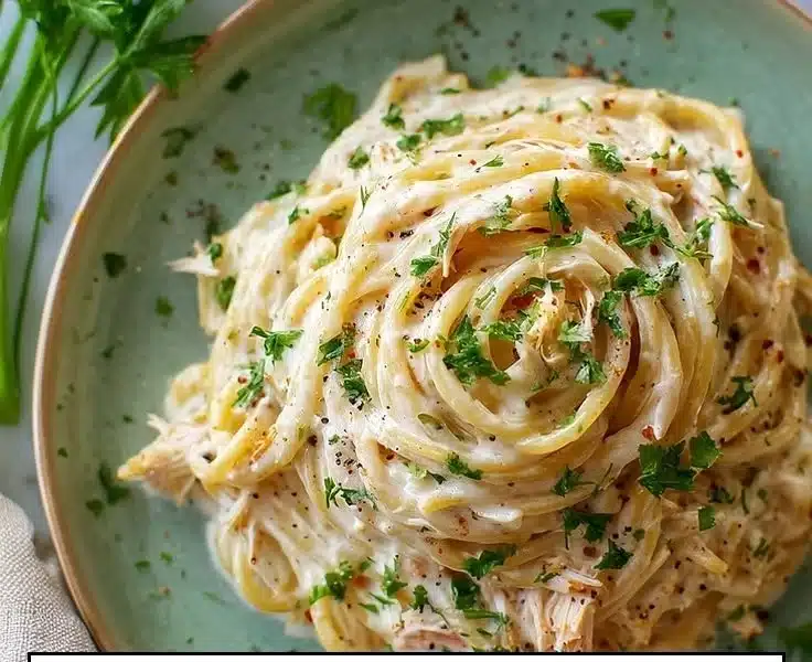 Tasty Crab Pasta Alfredo - thegirlskitchen 4 Delicious crab pasta alfredo dish garnished with herbs and served in a creamy sauce