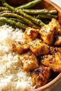 Delicious honey mustard chicken bowls with fresh veggies and grains
