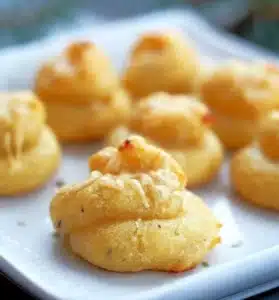 Freshly baked cheese puffs, light and fluffy snack with a golden crust.