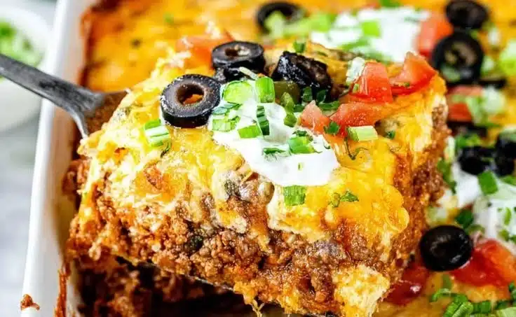 Mexican Casserole 4 Delicious Mexican casserole topped with cheese and fresh ingredients
