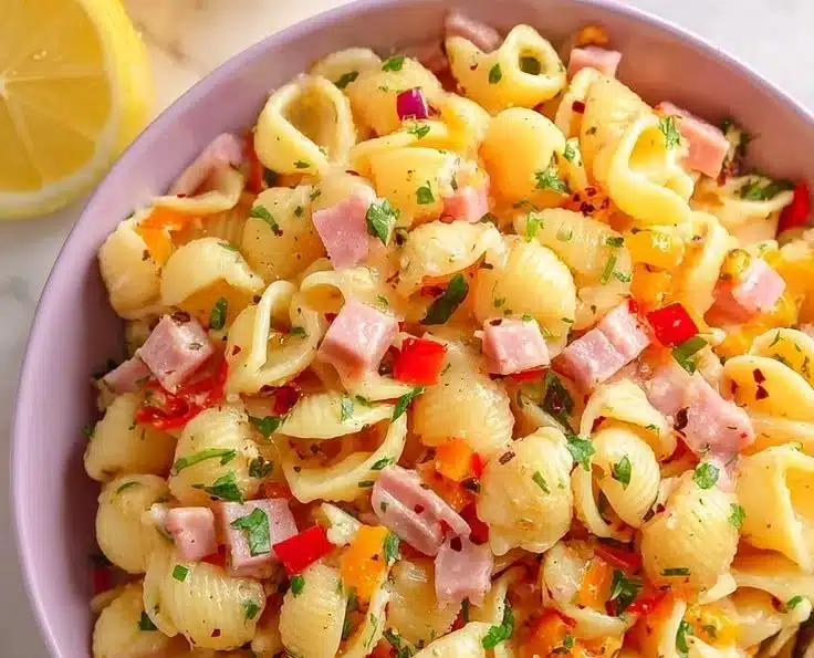 No mayo ham pasta salad featuring fresh ingredients and vibrant colors