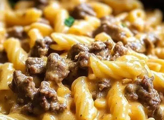 Creamy beef pasta dish in a crockpot, perfect comfort food recipe