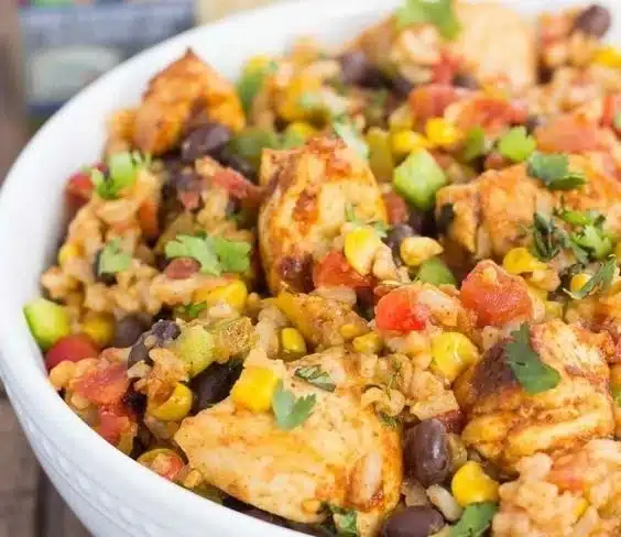 Southwest Chicken and Rice Bowls 2 Bowl of Southwest Chicken and Rice with colorful ingredients and spices