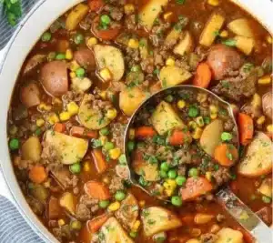 Delicious bowl of beef pot pie soup ready to serve